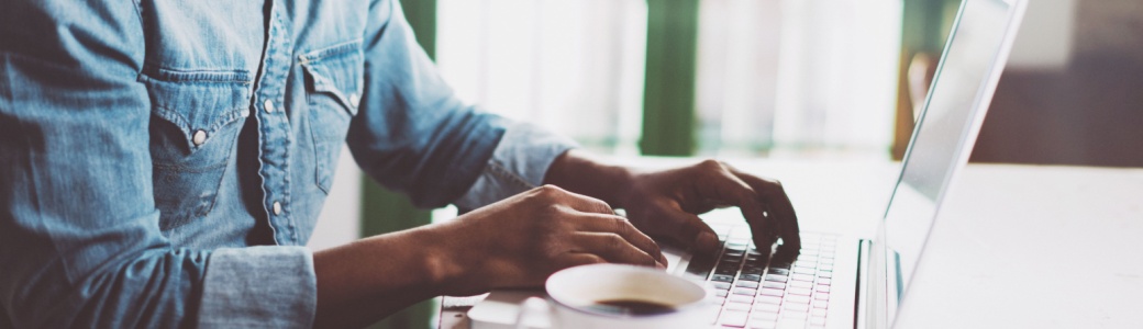 A man working from home on a laptop.